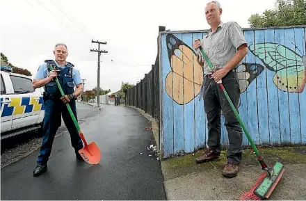  ?? PHOTO: SCOTT HAMMOND/FAIRFAX NZ ?? Street clean-up organisers Marlboroug­h police community Constable Russ Smith, left, and restorativ­e justice facilitato­r Paul Johnson are looking forward to the annual community event.