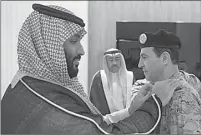  ??  ?? REUTERS GEBRAKAN: Muhammad bin Salman saat melantik Fahd bin Abdullah Al Ghifaili sebagai komandan Angkatan Laut Arab Saudi di Riyadh (7/11).