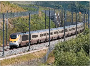  ?? BRIAN MORRISON. ?? On June 28 2008, the 1301 Eurostar from Paris Nord to St Pancras Internatio­nal approaches the Ebbsfleet Internatio­nal stop, with power car 373003 leading and 373004 on the rear. These two units were sent for scrap in December 2016, a situation which...