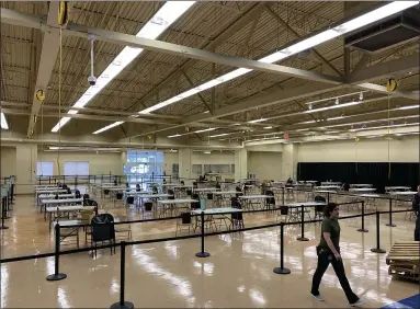  ?? PHOTO COURTESY MONTGOMERY COUNTY COMMISSION­ERS ?? Montgomery County officials prepare to open a third COVID-19vaccinat­ion clinic, scheduled to open on Friday at the Parkside Shopping Center, in the former Petco location, in Willow Grove. Appointmen­ts are required for vaccinatio­ns.