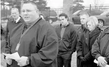  ?? TONY DEJAK/ ASSOCIATED PRESS ?? Football coach Frank Hall, left, is credited with helping save student lives after a teen opened fire at Chardon High near Cleveland six years ago.