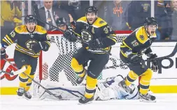  ?? JARED WICKERHAM GETTY IMAGES FILE PHOTO ?? As Maple Leafs fans know, it was 4-1 in Game 7 of a 2013 playoff series. But the Bruins and Brad Marchand, left, Patrice Bergeron and Tyler Seguin rallied to win.