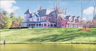  ?? Contribute­d photos ?? This Oxford property comprising 25 acres features a pond for kayaking and a five- bedroom Victorian- style home.