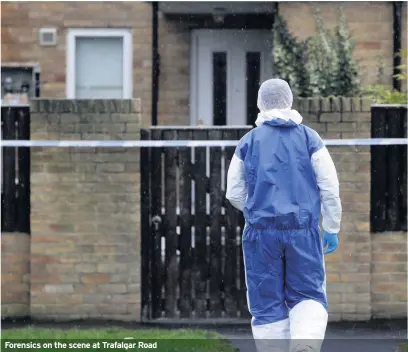  ??  ?? Forensics on the scene at Trafalgar Road