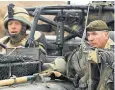  ??  ?? As Chief of General Staff (right) visiting troops in Maysan Province, Iraq, in 2006