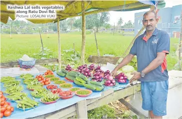  ?? Picture: LOSALINI VUKI ?? Keshwa Lal sells vegetables along Ratu Dovi Rd.