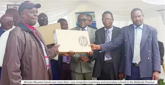  ?? ?? Minister Muswere hands over more than 1 000 computers to primary and secondary schools in the Midlands Province