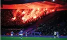  ?? Jason Cairnduff/Action Images/Reuters ?? Legia Warsaw’s travelling support lit flares and clashed with police during the second half of their side’s defeat to Leicester. Photograph: