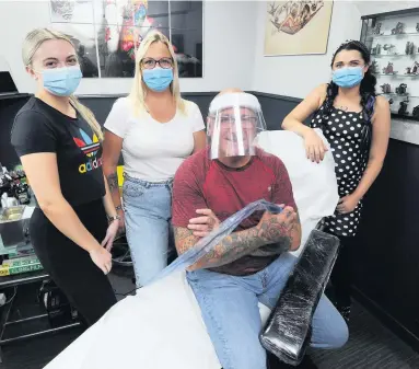  ??  ?? Good to be back Pictured at Bodyart Tattoo, in the Lorne Arcade, are Ian McFadzean with (L-R) Hannah McQue, Tracy McFadzean Brown and Victoria Stevenson