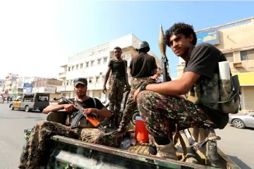  ??  ?? File photo shows Houthi militants patrol a street where pro-Houthi protesters demonstrat­ed against the Saudi-led coalition in Hodeidah, Yemen. — Reuters photo