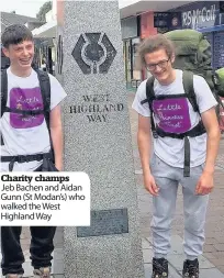  ??  ?? Charity champs Jeb Bachen and Aidan Gunn (St Modan’s) who walked the West Highland Way