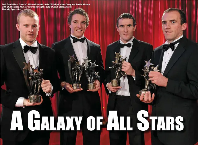  ?? Photo by Sportsfile ?? Cork footballer­s, from left, Michael Shields, Aidan Walsh, Graham Canty and Paudie Kissane with GAA Football All-Star awards during the 2010 GAA All-Stars Awards