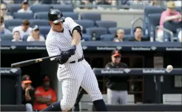  ?? FRANK FRANKLIN – THE ASSOCIATED PRESS ?? Register columnist says while the Yankess are overachiev­ing at the moment, every plate appearance by Aaron Judge has become must watch television.