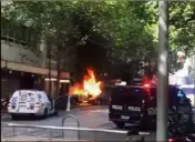  ?? (DR) ?? Le véhicule du terroriste, ici en flammes, était rempli de bouteilles de gaz.