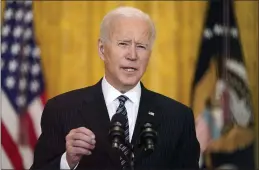  ?? ANDREW HARNIK — THE ASSOCIATED PRESS ?? President Joe Biden speaks about COVID-19vaccinat­ions from the East Room of the White House in Washington on Thursday.