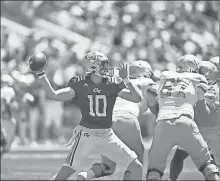  ?? Georgia Tech Athletics ?? Yellow Jackets quarterbac­k Haynes King throws a pass during Georgia Tech’s 2024 White and Gold spring game.
Ireland, but I think we’re on the we have a chance to be a good right track,” Key said. “I think football team this year.”