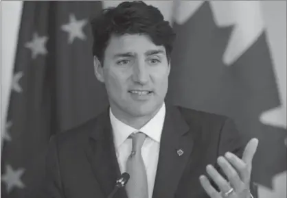  ?? SEAN KILPATRICK, THE CANADIAN PRESS ?? Prime Minister Justin Trudeau faces trouble in B.C. where the soon-to-be NDP government will oppose his pipeline promise.