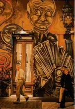  ??  ?? Wall and piece: a mural of Piazzolla in Buenos Aires; (left) a 2015 New York performanc­e of María de Buenos Aires by Long Beach Opera