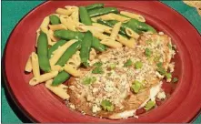  ?? LINDA GASSENHEIM­ER/ TNS ?? Sole Almondine (AlmondCrus­ted Sole) with Penne and Sugar Snap Peas only takes minutes to make.