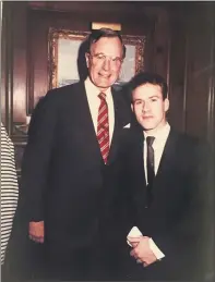  ?? Contribute­d / ?? The nation’s 41st president, George H.W. Bush, poses with photograph­er-at-large and musician Bob Capazzo in Greenwich in 1988.