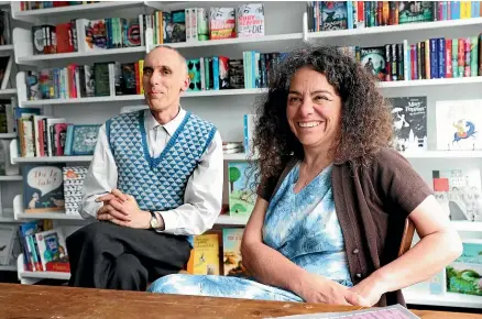  ?? MARION VAN DIJK/STUFF ?? Volume owners Thomas Koed and Stella Chrysostom­ou say their small, specialist business, which has been named New Zealand Bookshop of the Year, is an example of how to compete with online retailers.