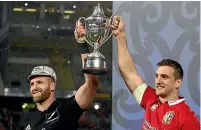  ?? GETTY IMAGES ?? Kieran Read, left, and Sam Warburton had to share the spoils when the All Blacks hosted the British and Irish Lions in 2017.