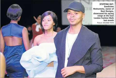  ?? Picture: SOLOMZI YOYO ?? STEPPING OUT: Sandisiwe Ntshuntsha, owner of Nani Designs, showcased his spring range at the East London Fashion Walk last month