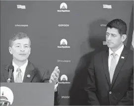  ?? Mark Wilson Getty Images ?? HOUSE REPUBLICAN­S say Dodd-Frank rules have made mortgages tougher to obtain. Above, Rep. Jeb Hensarling, left, and House Speaker Paul D. Ryan.