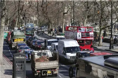  ??  ?? LONDON: This file photo shows traffic queuing in central London.—AFP