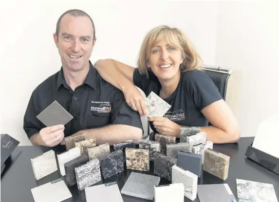  ?? Mandy Jones ?? > Dylan and Julie Williams display Stoneworkz Industries’ wares