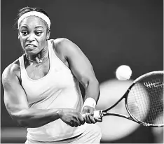  ??  ?? Sloane Stephens hits a return against Anastasija Sevastova during their women’s singles match at the Zhuhai Elite Trophy tennis tournament in Zhuhai, in south China’s Guangdong province. — AFP photo