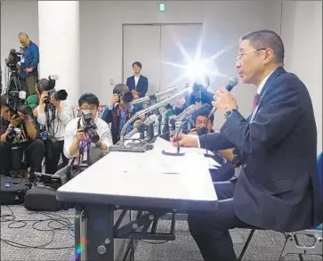  ?? Shuji Kajiyama Associated Press ?? HIROTO SAIKAWA, chief executive of Nissan, speaks in Yokohama, Japan, about Chairman Carlos Ghosn, who was arrested on suspicion of underrepor­ting his compensati­on to regulators and other misconduct.