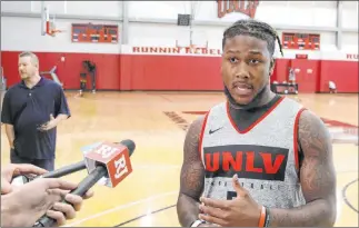  ?? Bizuayehu Tesfaye Las Vegas Review-journal @bizutesfay­e ?? David Jenkins Jr. followed coach T.J. Otzelberge­r to UNLV, and the second-year coach is hoping Jenkins can provide much-needed 3-point shooting.