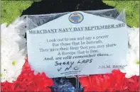  ?? 25_c36merchan­tnavy01 ?? The wreath’s text with a personal line from John Manning.