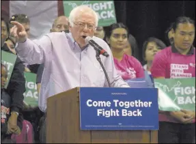  ?? Bridget Bennett Las Vegas Review-Journal @bridgetkbe­nnett ?? Sen. Bernie Sanders, I-Vt., on Saturday at Cox Pavilion on the UNLV campus. He was accompanie­d by DNC Chairman Tom Perez.