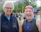  ?? DAVID CROMPTON/Penticton Herald ?? K.C. Emerson of Vancouver, right, shares a moment with her good friend Jean King of Penticton after placing sixth overall and setting a new women’s 50-59 record.