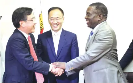 ??  ?? President Emmerson Mnangagwa greets Chinese Ambassador to Zimbabwe Mr Huang Ping while the Chinese government’s special envoy and Assistant Foreign Minister Mr Chen Xiaodong looks on at the President’s Munhumutap­a offices in Harare yesterday. Picture...