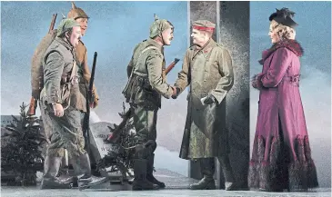  ?? KARLI CADEL GLIMMERGLA­SS ?? Maxwell Levy, Stephen Martin and Charles H. Eaton as German soldiers with Arnold Livingston Geis and Mary Evelyn Hangley in the Glimmergla­ss Festival's 2018 production of Silent Night.