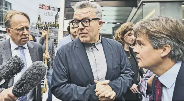  ?? PICTURE: DOMINIC LIPINSKI/PA ?? 0 Labour Deputy leader Tom Watson is met by the press after leaving the National Executive Committee meeting