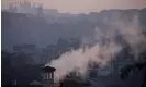  ?? Tarantino/AP ?? Smoke billows from chimneys of residentia­l buildings in Rome. Photograph: Alessandra