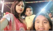  ??  ?? Ishara Bechan with her daughters Yurican and Aahana just after their prayer on Friday.