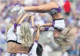  ??  ?? Baltimore Ravens cheerleade­rs in action.