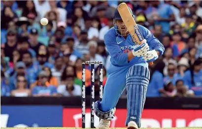  ?? AFP ?? India’s Mahendra Singh Dhoni’s inability to set the pace during middle overs is a major cause of concern for the Indian team. —