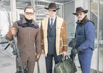  ?? Giles Keyte 20th Century Fox ?? COLIN FIRTH, center, is flanked by Taron Egerton, left, and Pedro Pascal in “Kingsman: The Golden Circle.”