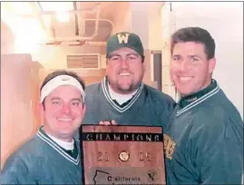  ?? COURTESY OF RICH CORNFORD ?? West High head football coach Rich Cornford, right, poses with assistant coaches Derrick Dunham, left, and Chris Bandy and the 2005 Central Section Division II championsh­ip trophy.