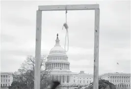  ?? GETTY-AFP
ANDREW CABALLERO-REYNOLDS/ ?? A noose is seen on makeshift gallows as supporters of US President Donald Trump gather on the West side of the U.S. Capitol in Washington DC on Jan. 6.