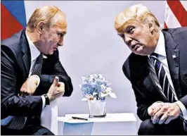  ?? EVAN VUCCI/AP 2017 ?? President Donald Trump, seen with Russian President Vladimir Putin, repeatedly has denied there was collusion between his presidenti­al campaign and Russians.