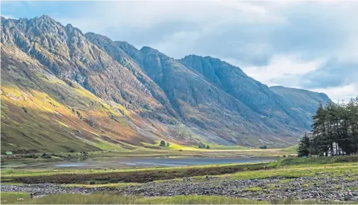  ??  ?? DIFFICULT TERRAIN: The challengin­g Aonach Eagach ridge above Loch Achtriocht­an north of Glencoe is not to be treated lightly