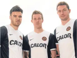  ??  ?? Scott Fraser, Callum Morris and Paul Dixon unveil United’s new away kit for the 2015/2016 season.