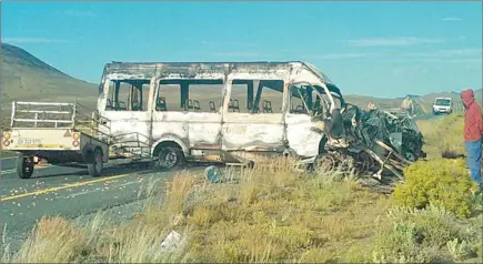  ?? PICTURES: JACQUES GROENEWALD ?? CARNAGE: Seven people were killed when a bakkie and a mini-bus taxi collided head- on outside of Laingsburg. Both vehicles caught alight, and the bodies of the victims were burnt beyond recognitio­n.